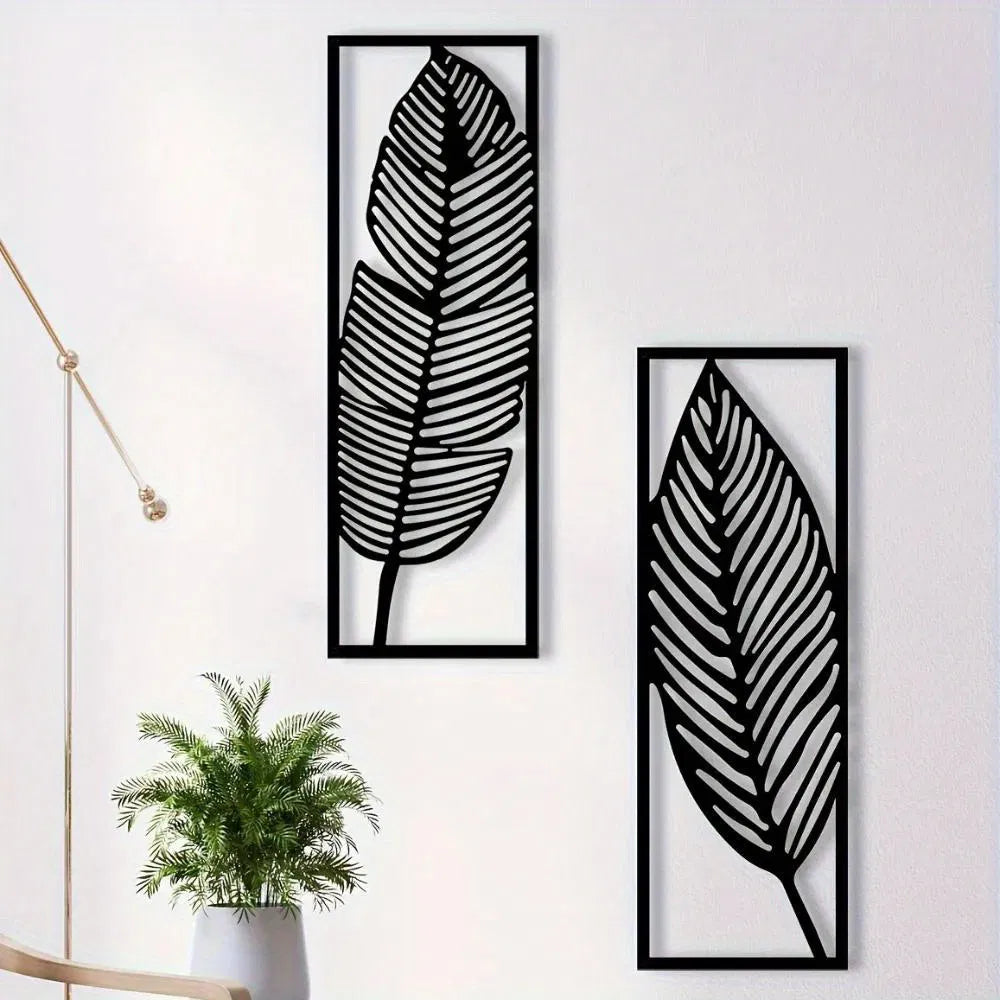 Two black metal leaf wall art panels, image 1 of 5