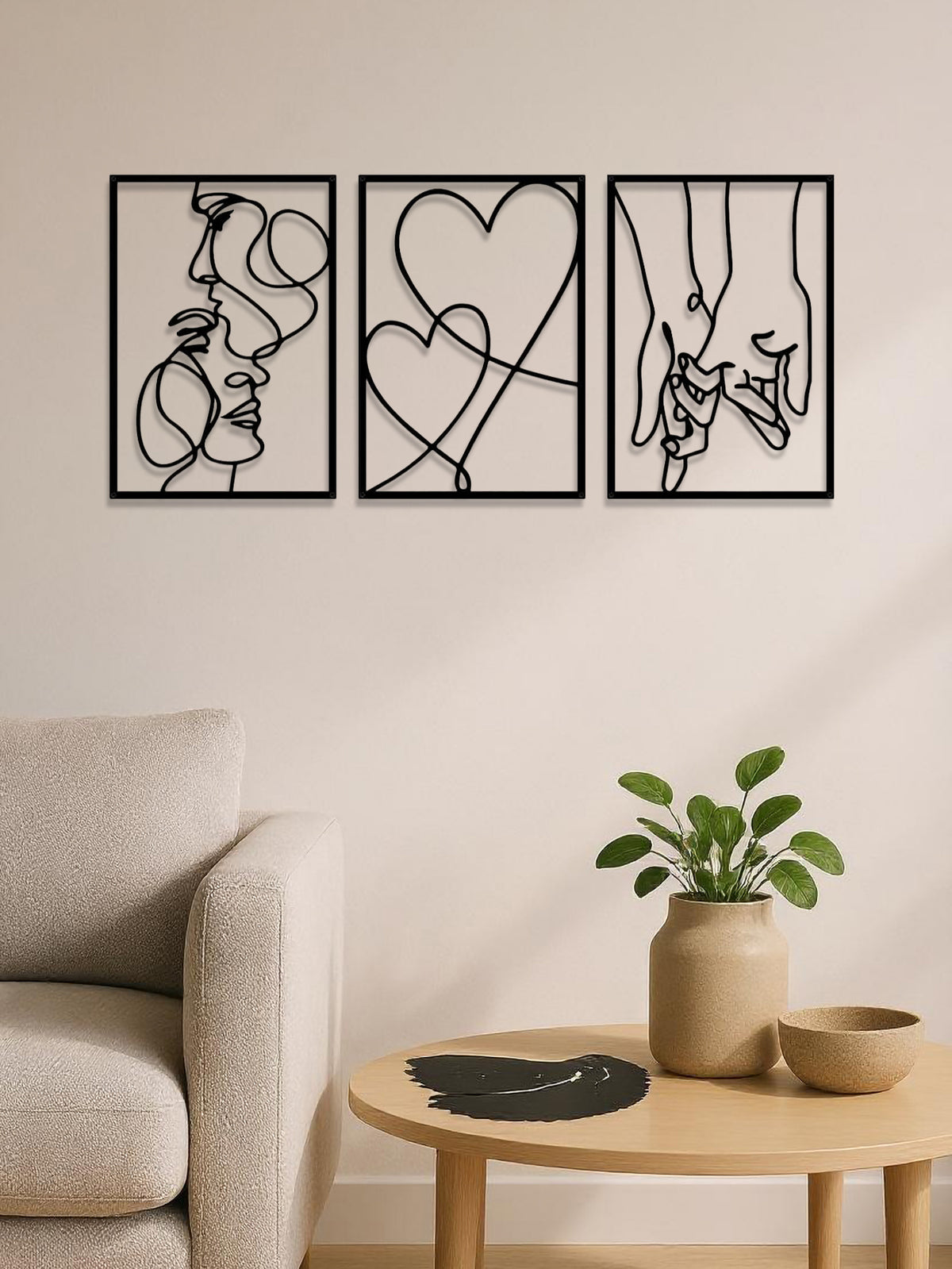 Three black metal line-art panels of a couple and a heart, image 1 of 5