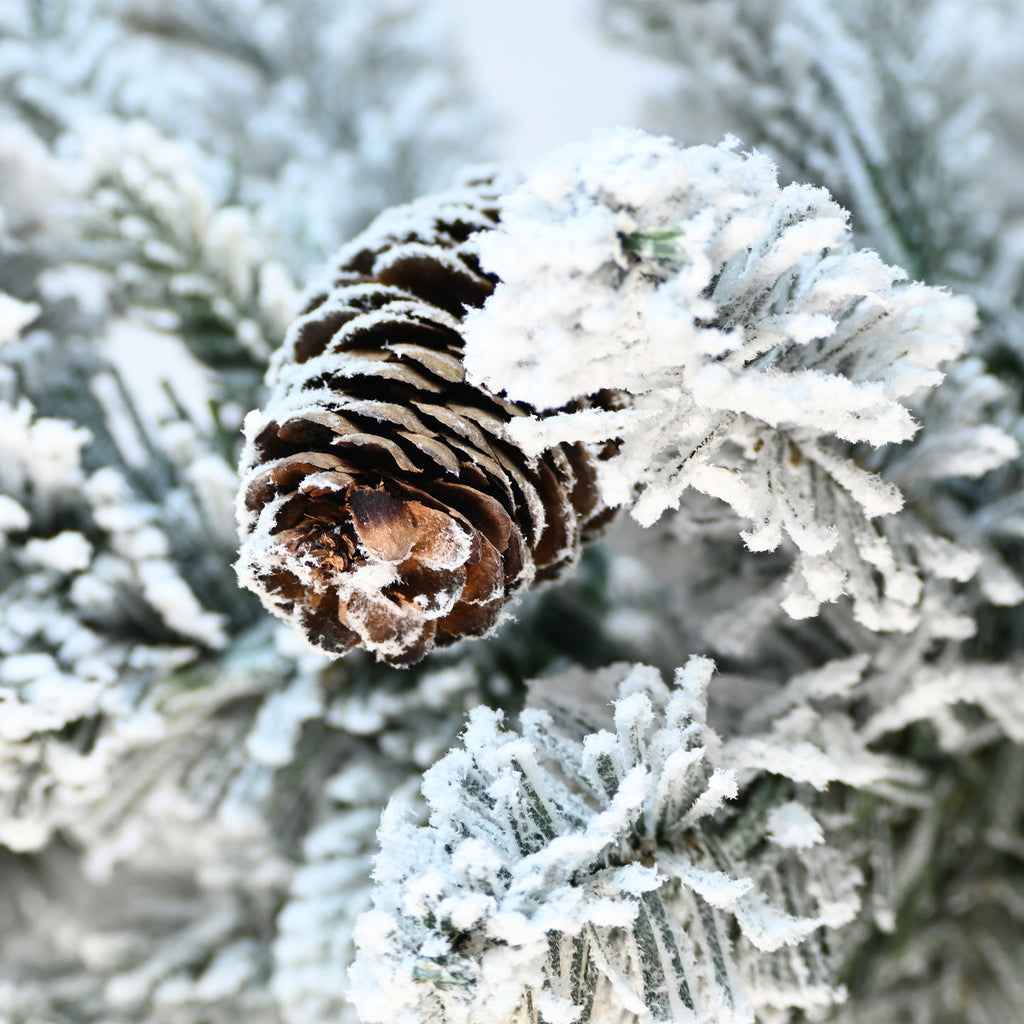 Flocked tabletop Christmas tree with pine cones in a pot, image 3 of 3