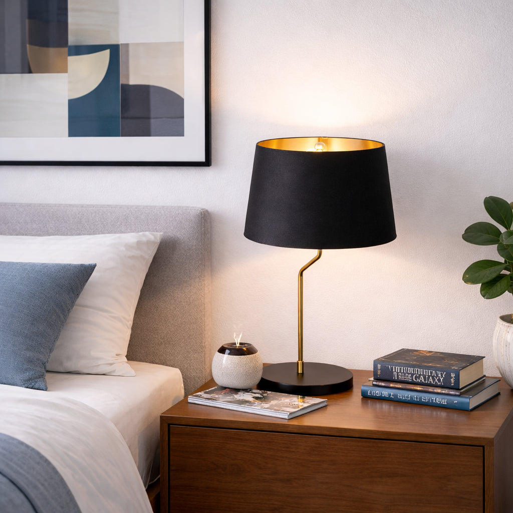 Black drum table lamp with gold-lined shade, image 1 of 5