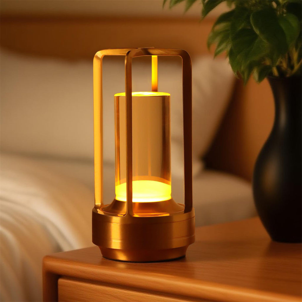 Gold cordless lantern table lamp with clear shade, image 1 of 5