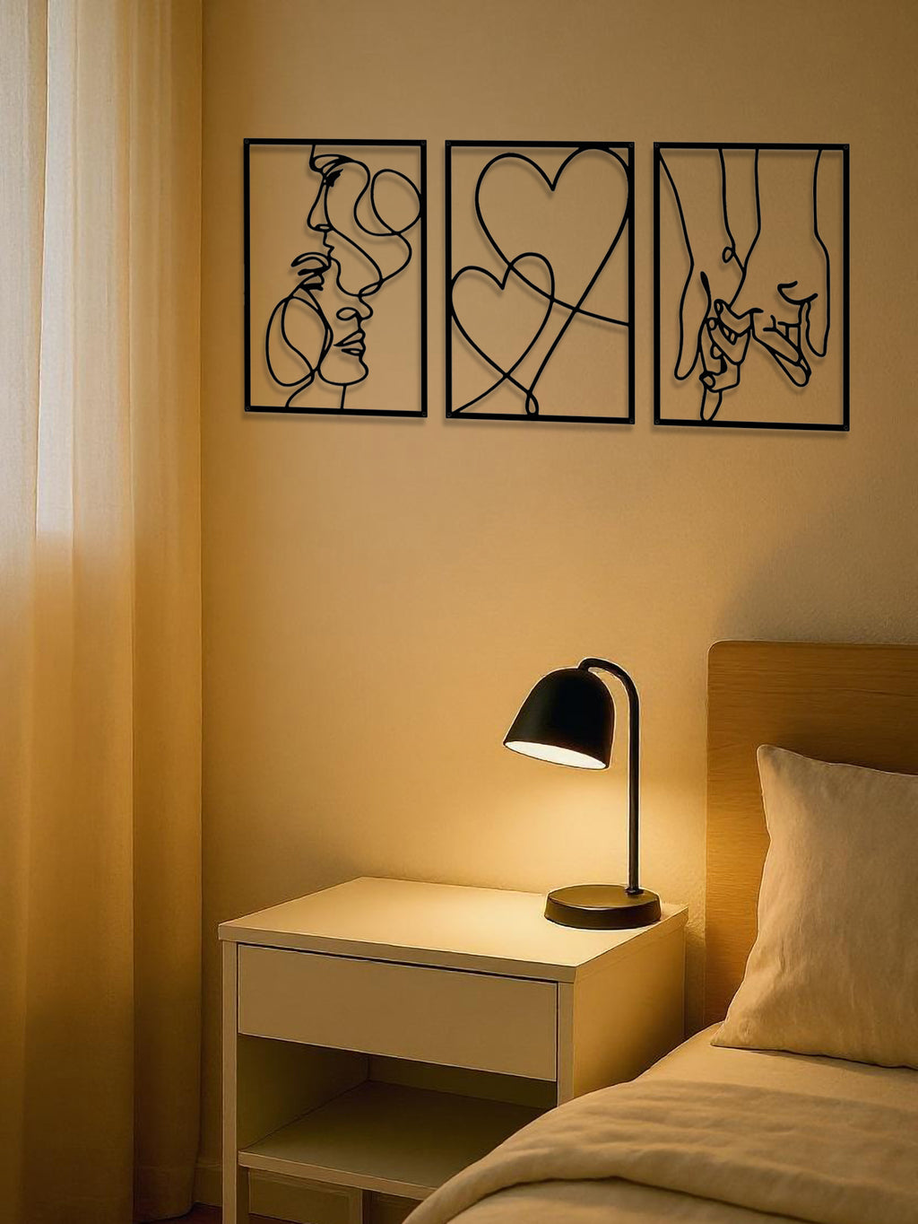 Three black metal line-art panels of a couple and a heart, image 2 of 5