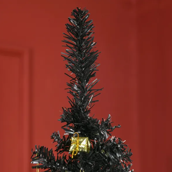 Black pencil Christmas tree beside a fireplace, image 2 of 4