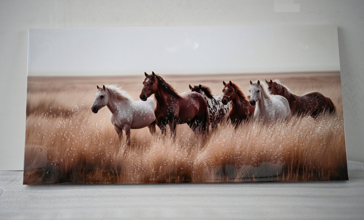 Canvas of horses in golden grassland above a sofa, image 3 of 4