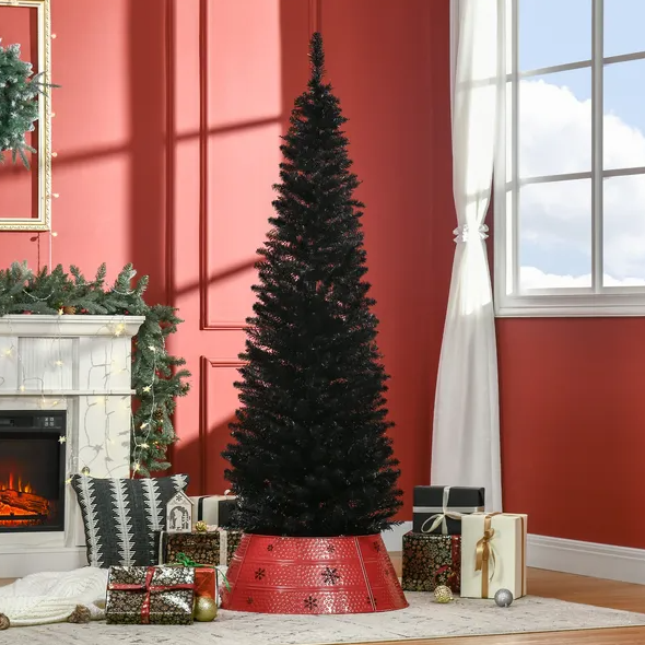 Black pencil Christmas tree beside a fireplace, image 1 of 4