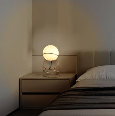 White glass globe table lamp on a matte gold spiral stand, image 3 of 5