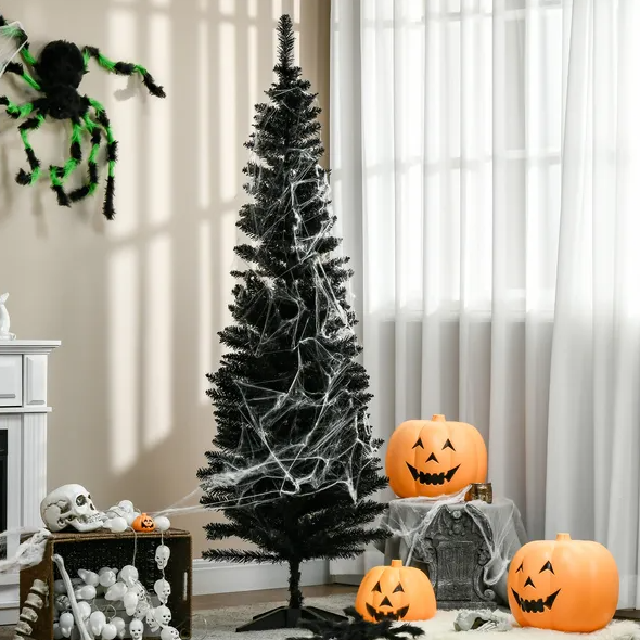 Black pencil Christmas tree beside a fireplace, image 4 of 4