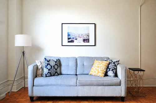 Adjustable Tripod Floor Lamp, Chrome and Silver, Linen Drum Shade in a real room, wider view