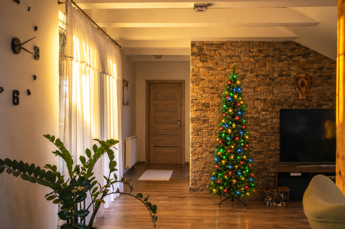 Pre-Lit Pencil Christmas Tree, 4.5 ft Fraser Fir with LEDs in a real room, wider view