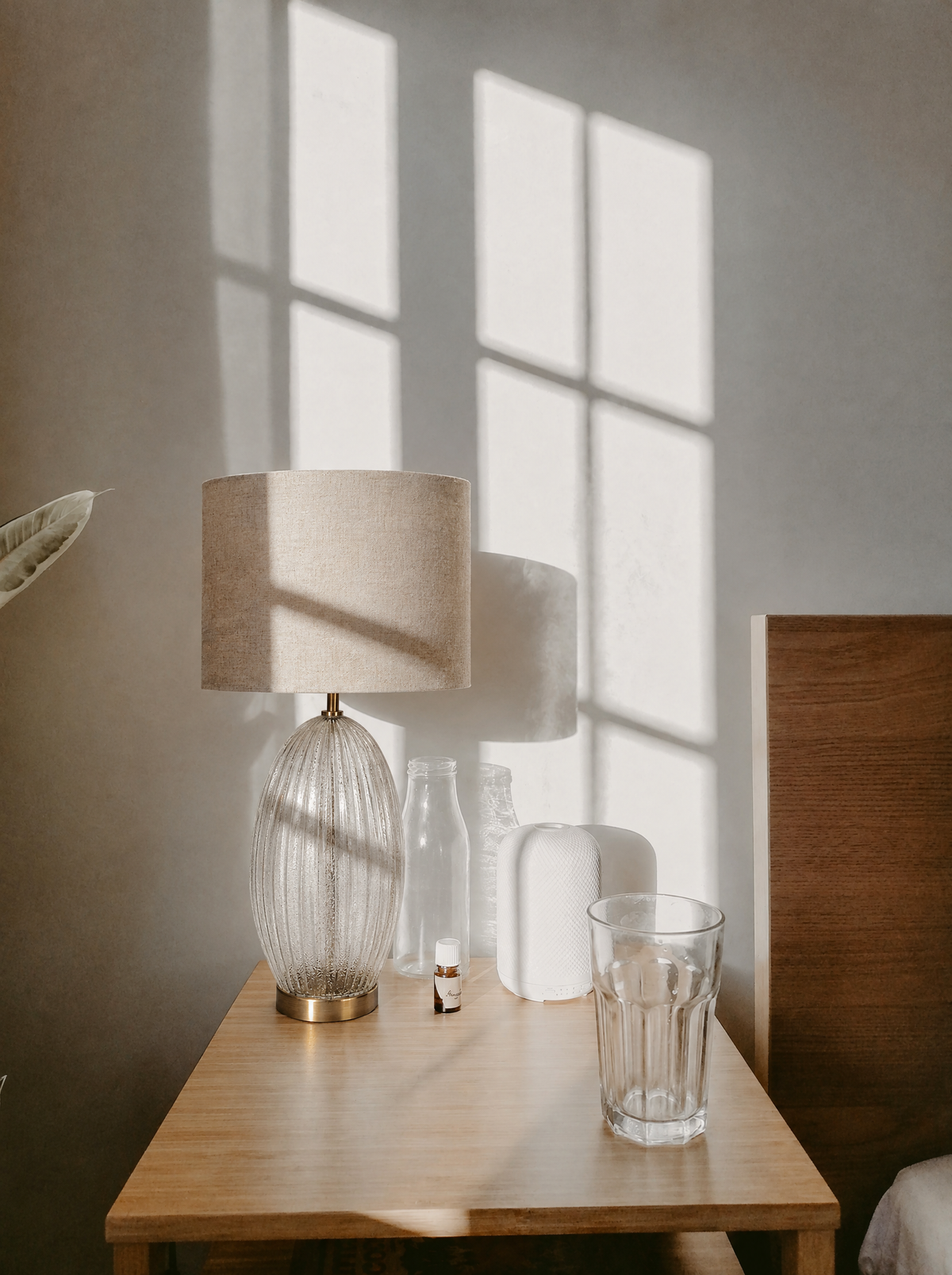 Ribbed Clear Glass Table Lamp with Gold Base and Drum Shade in a real room