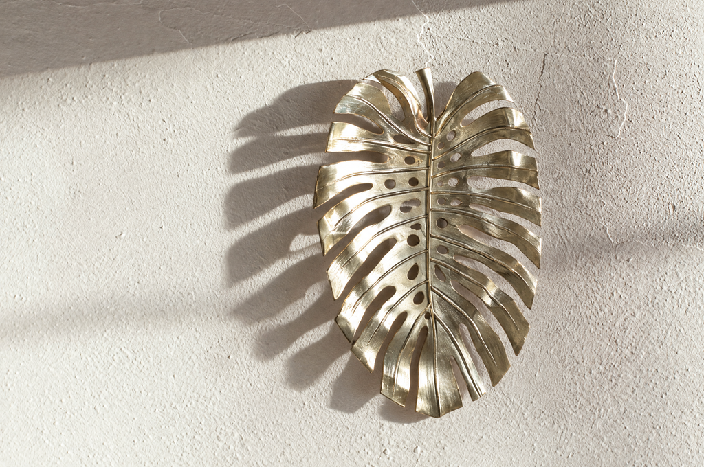 Gold Monstera Leaf Wall Decor, Aluminum, 18.9 x 13.4 in in a real room