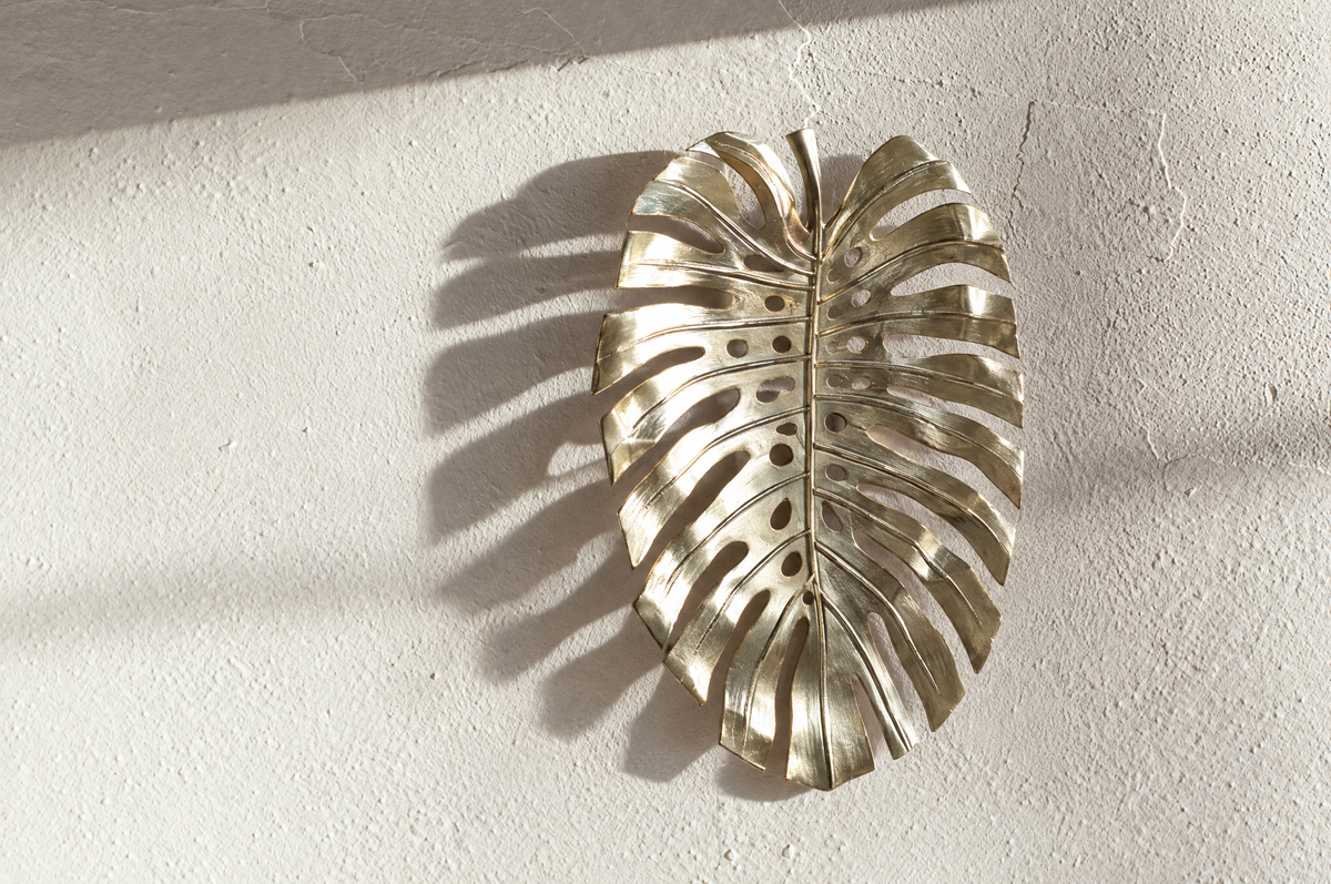 Gold Monstera Leaf Wall Decor, Aluminum, 18.9 x 13.4 in in a real room